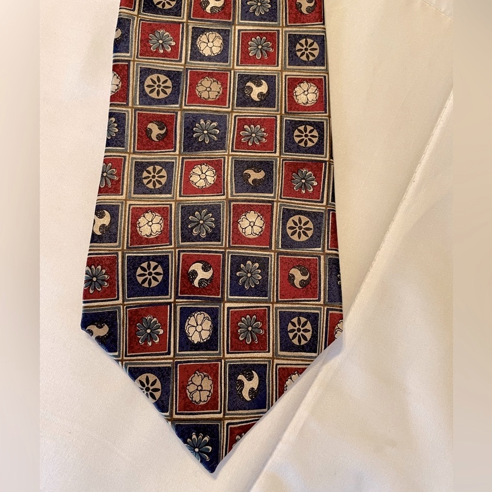 J T Beckett 100% silk necktie in dark red, blue, and light tan